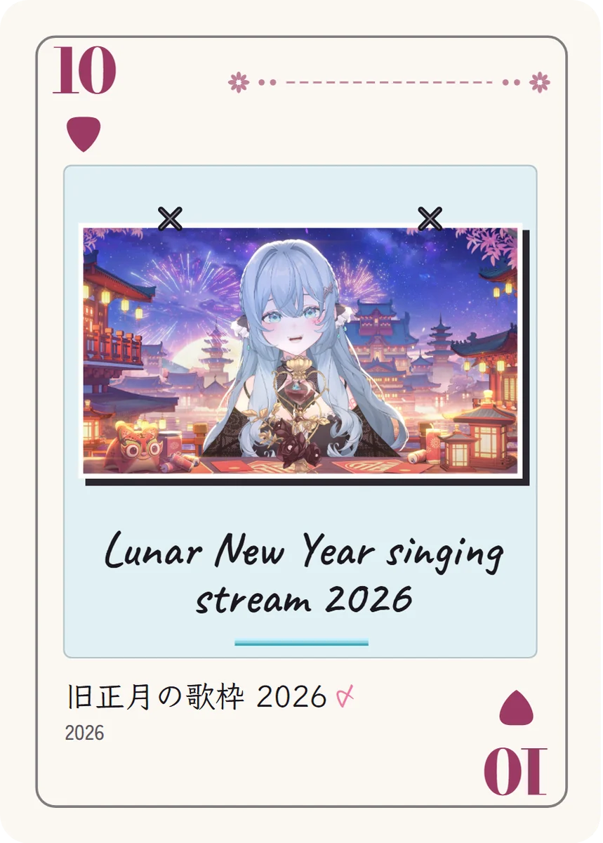 ピックの10: 夜空の花火と灯籠の街を背に、黒いドレスのめめが笑っている。