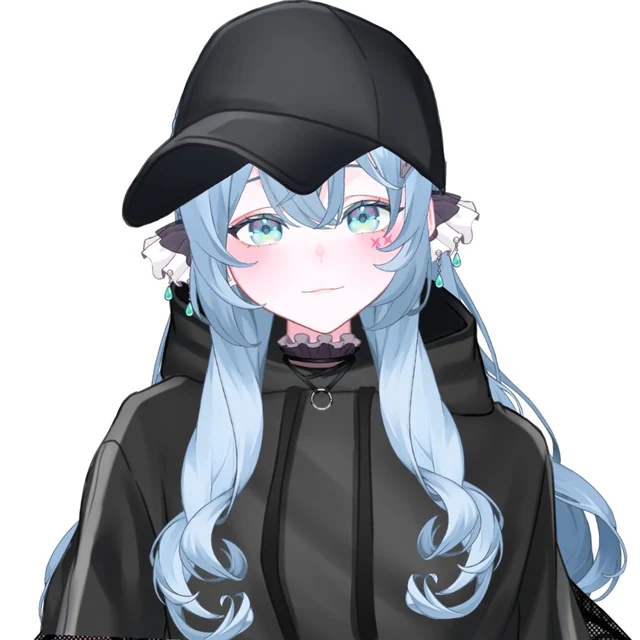 黒いキャップと黒いパーカーのめめが、少し驚いた顔でこちらを見ている。
